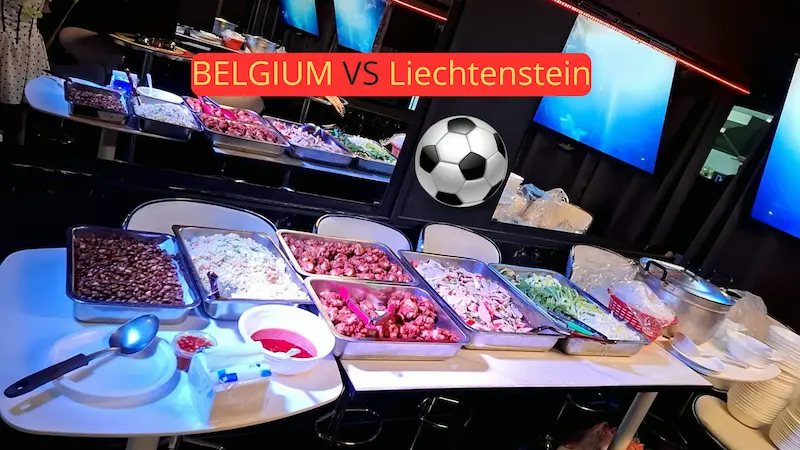 Football match screening Belgium vs Liechtenstein with free buffet and large screens throughout the establishment.